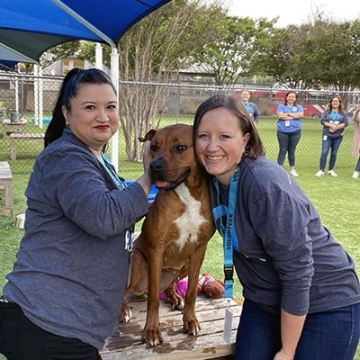 two women with dog